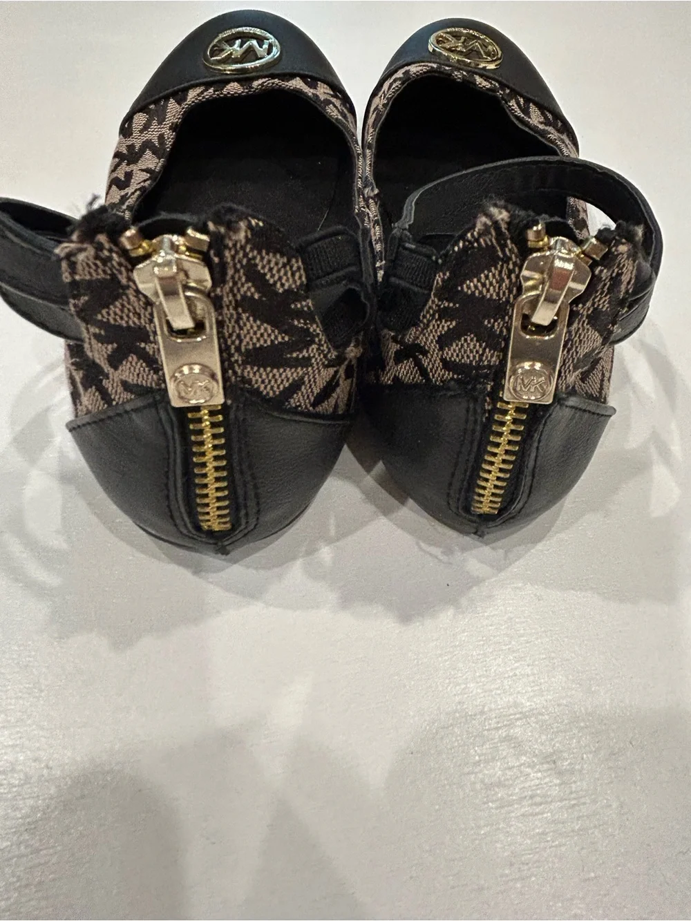 Michael Kors Black and Brown Logo Ballet Flats with Gold MK Medallion